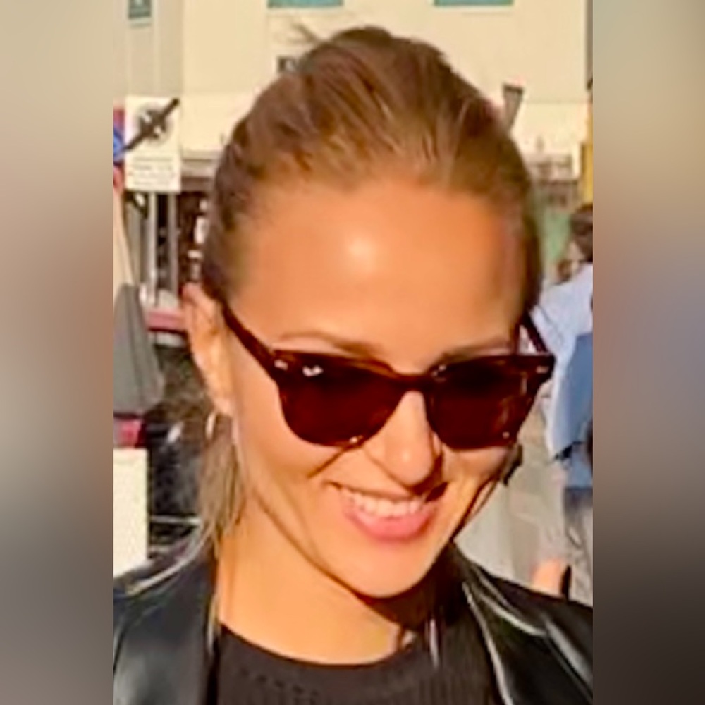 Ray-ban sunglasses and case.  Uni-sex style